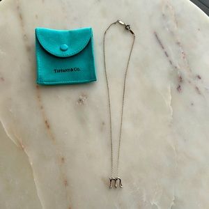 Tiffany & Co “M” silver pendant with 16 inch silver chain
